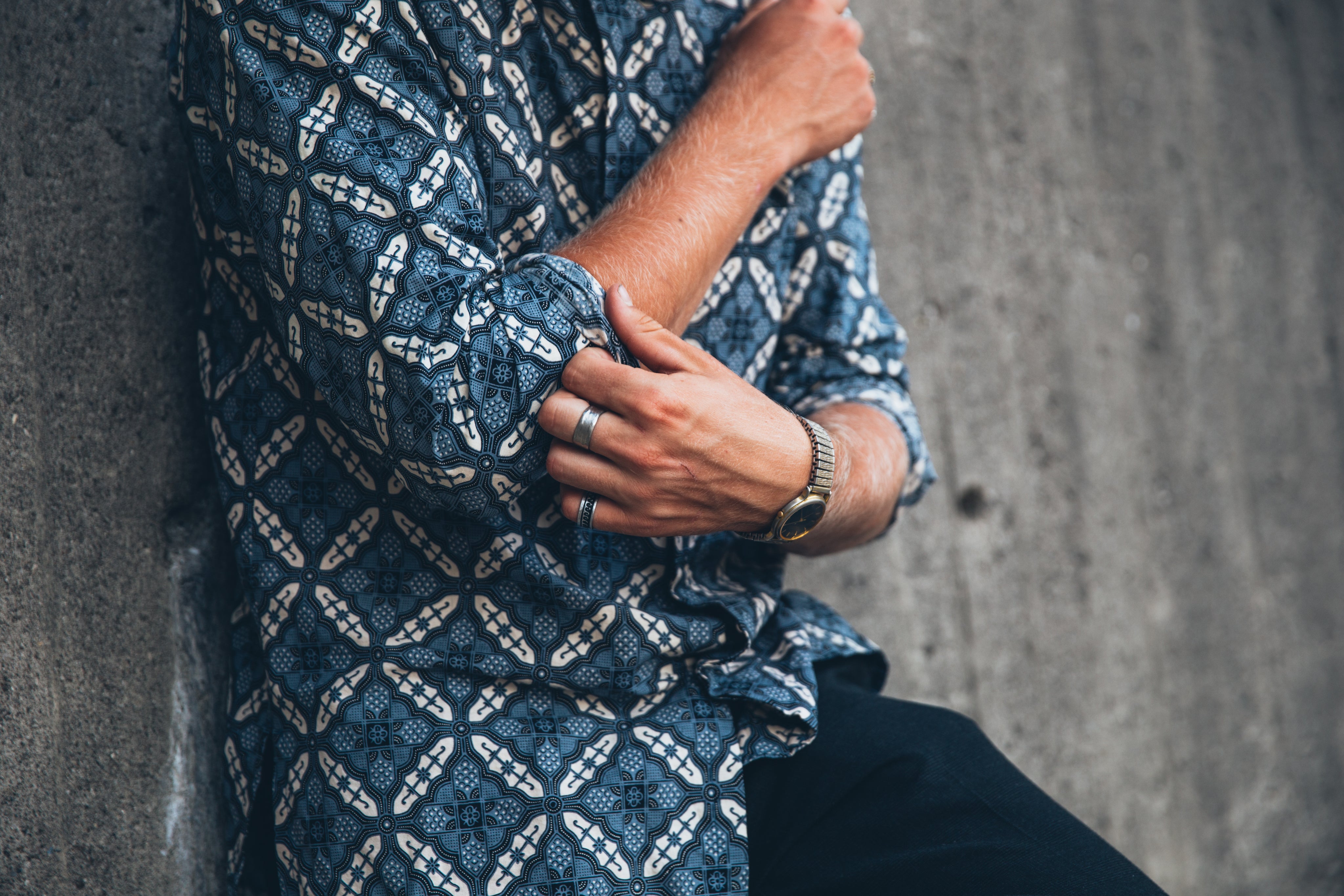 files/man-rolls-up-shirt-sleeves.jpg